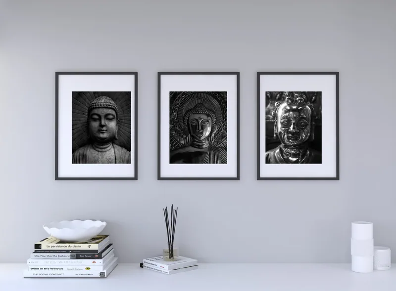 A row of three: Matched black frames for a triptych.